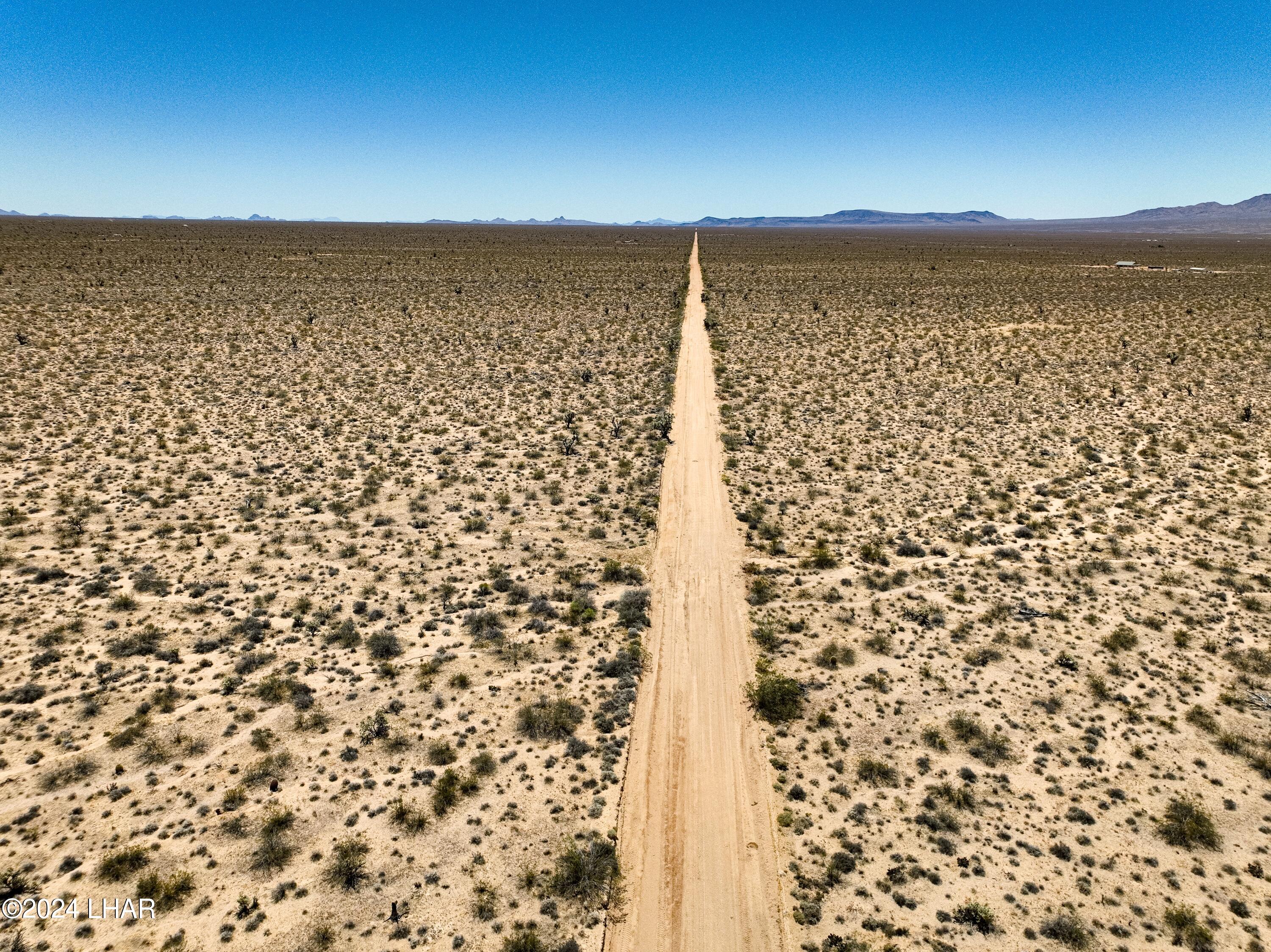 606 South Billy The Kid Road Yucca, AZ 86438 - Photo 5 of 23 DJI_0080-resized 2