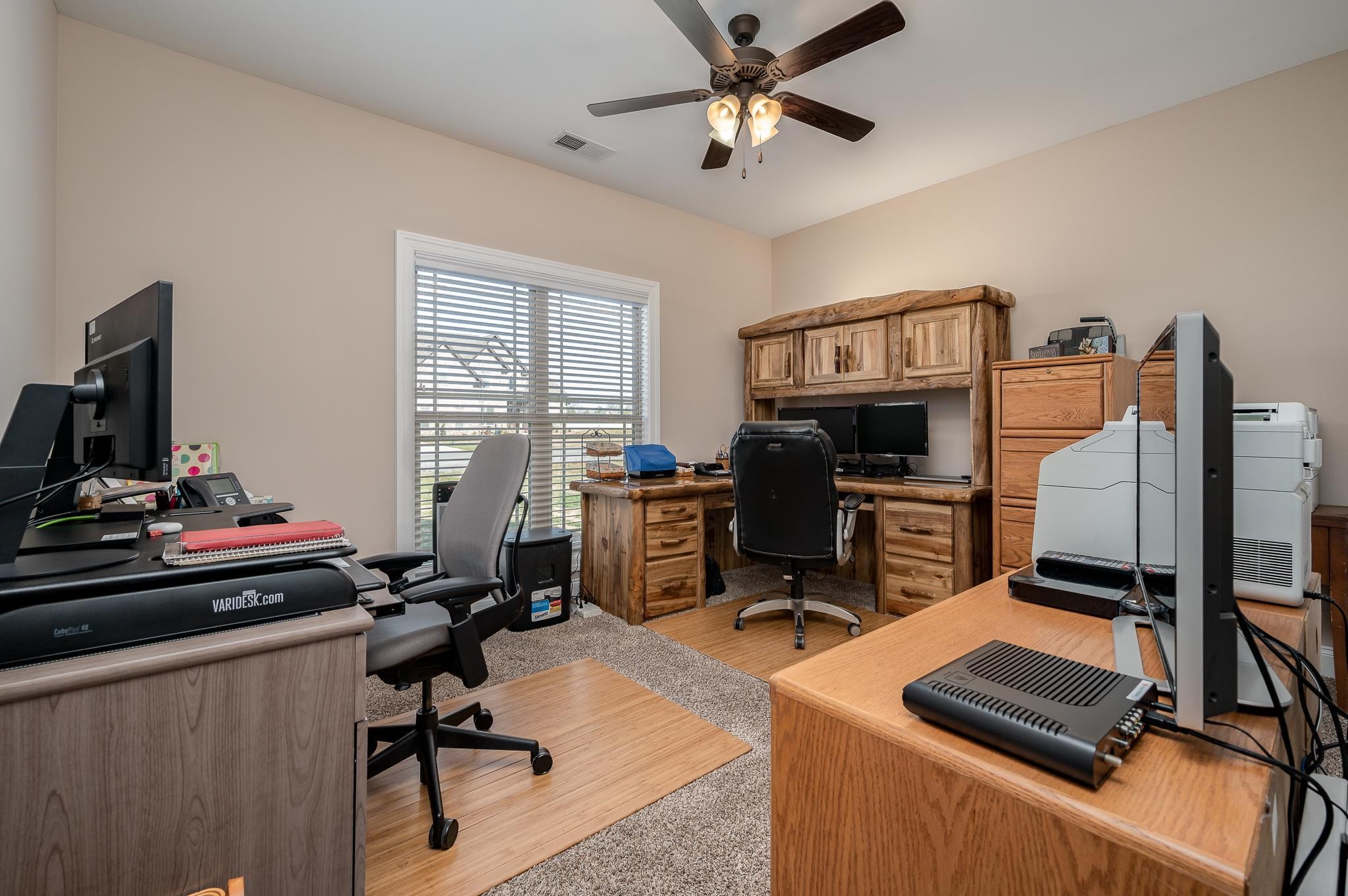 4306 Singleton Drive Murfreesboro, TN 37127 - Photo 13 of 34 a view of a workspace with furniture and a window
