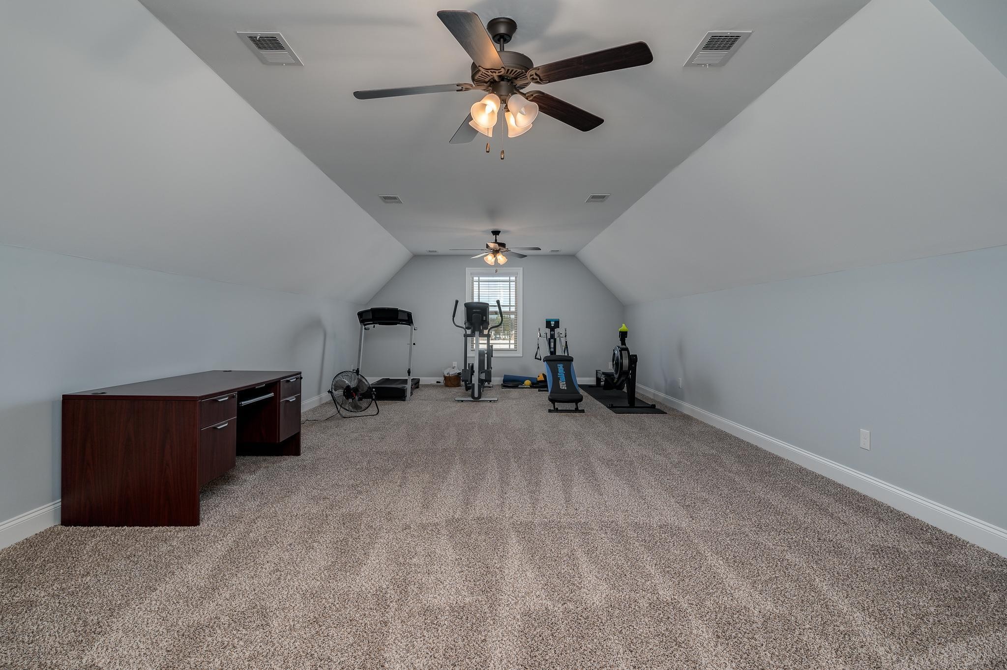 4306 Singleton Drive Murfreesboro, TN 37127 - Photo 26 of 34 a big room with chandelier fan and windows