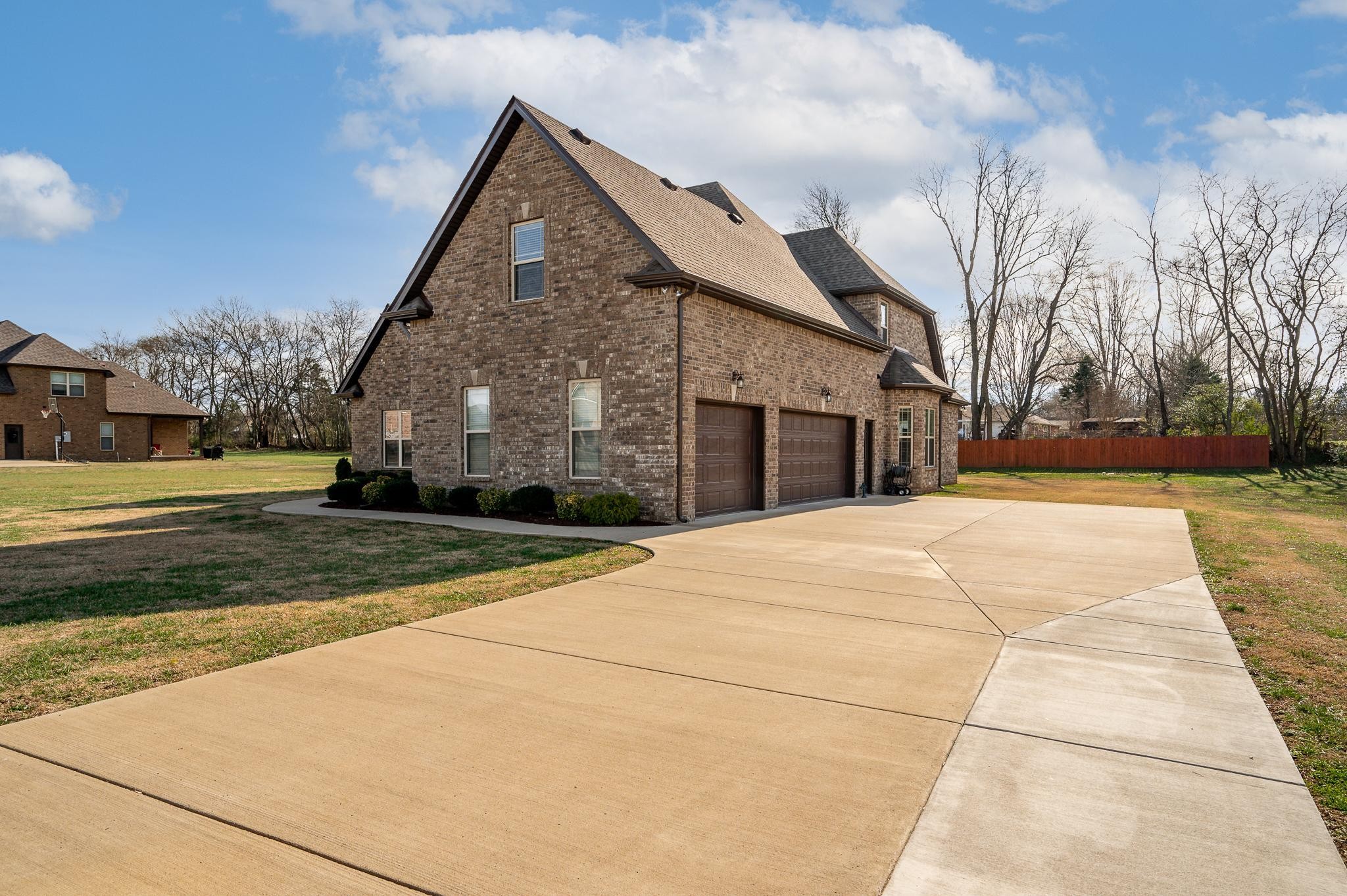 4306 Singleton Drive Murfreesboro, TN 37127 - Photo 31 of 34 a front view of a house with a yard