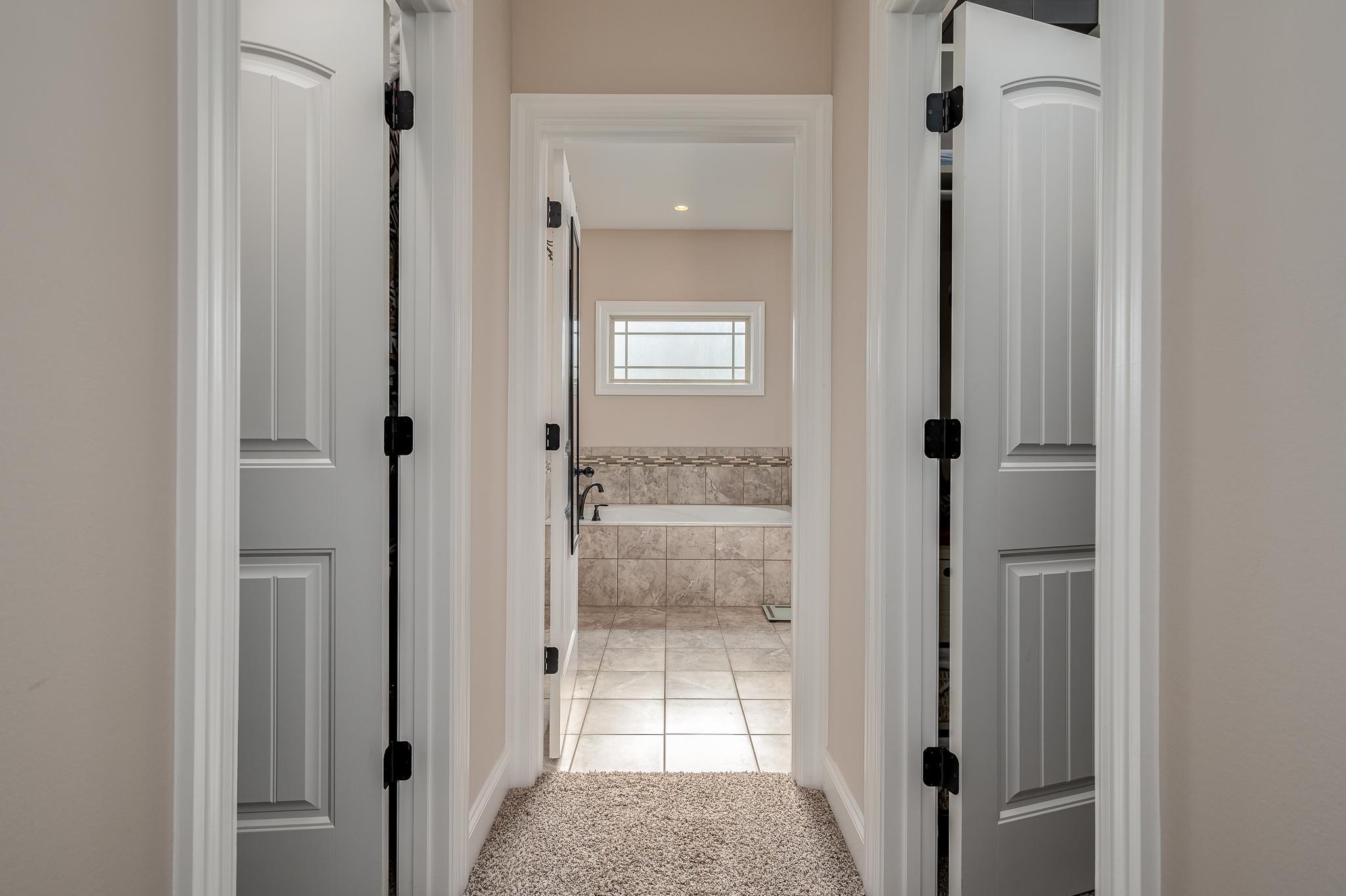 4306 Singleton Drive Murfreesboro, TN 37127 - Photo 8 of 34 a view of a bathroom from a hallway