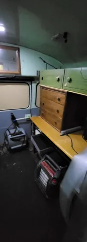 a kitchen with a stove and a microwave