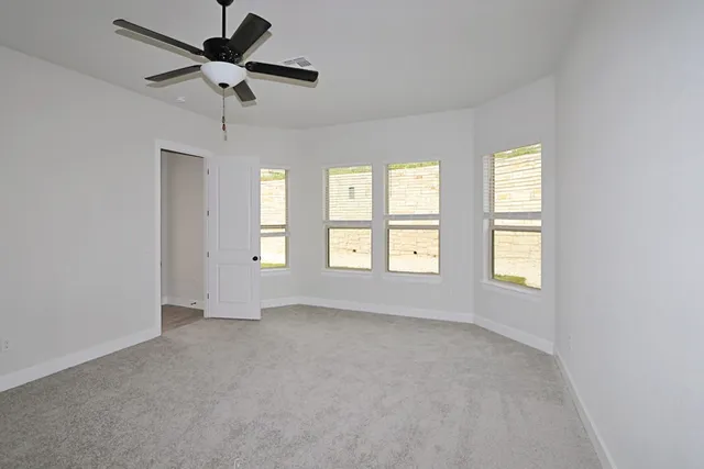 a view of a kitchen with a sink and dishwasher a refrigerator with wooden floor