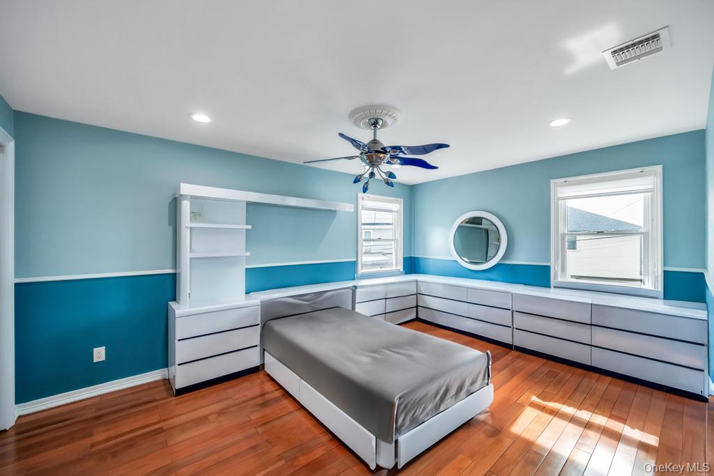 6 Garden Circle Syosset, NY 11791 - Photo 17 of 29 a living room with furniture and a window