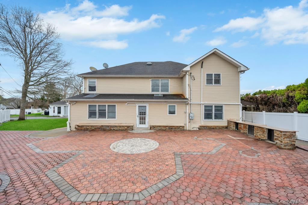 6 Garden Circle Syosset, NY 11791 - Photo 28 of 29 a view of a house with a yard