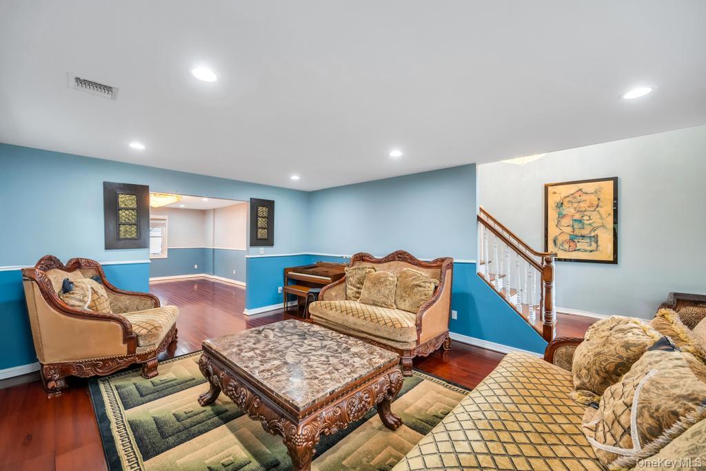 6 Garden Circle Syosset, NY 11791 - Photo 7 of 29 a living room with furniture and a window