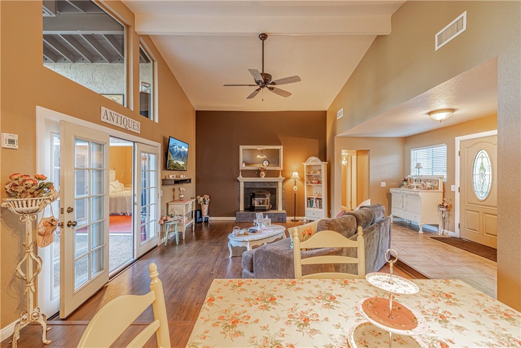 2701 West Ave J4 Lancaster, CA 93536 - Photo 12 of 46 a living room with furniture fireplace and wooden floor
