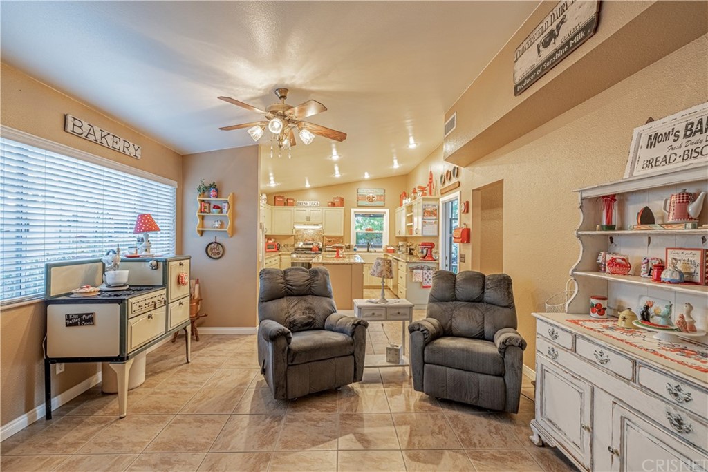 2701 West Ave J4 Lancaster, CA 93536 - Photo 14 of 46 a living room with furniture and a window