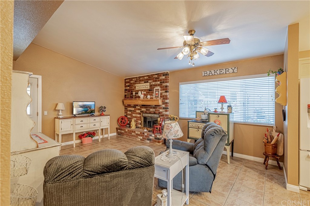 2701 West Ave J4 Lancaster, CA 93536 - Photo 15 of 46 a living room with furniture and a window
