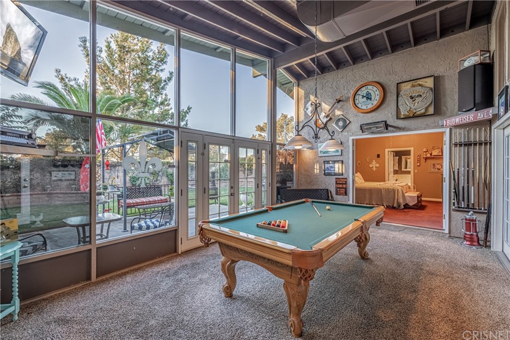 2701 West Ave J4 Lancaster, CA 93536 - Photo 21 of 46 a room with pool table and windows