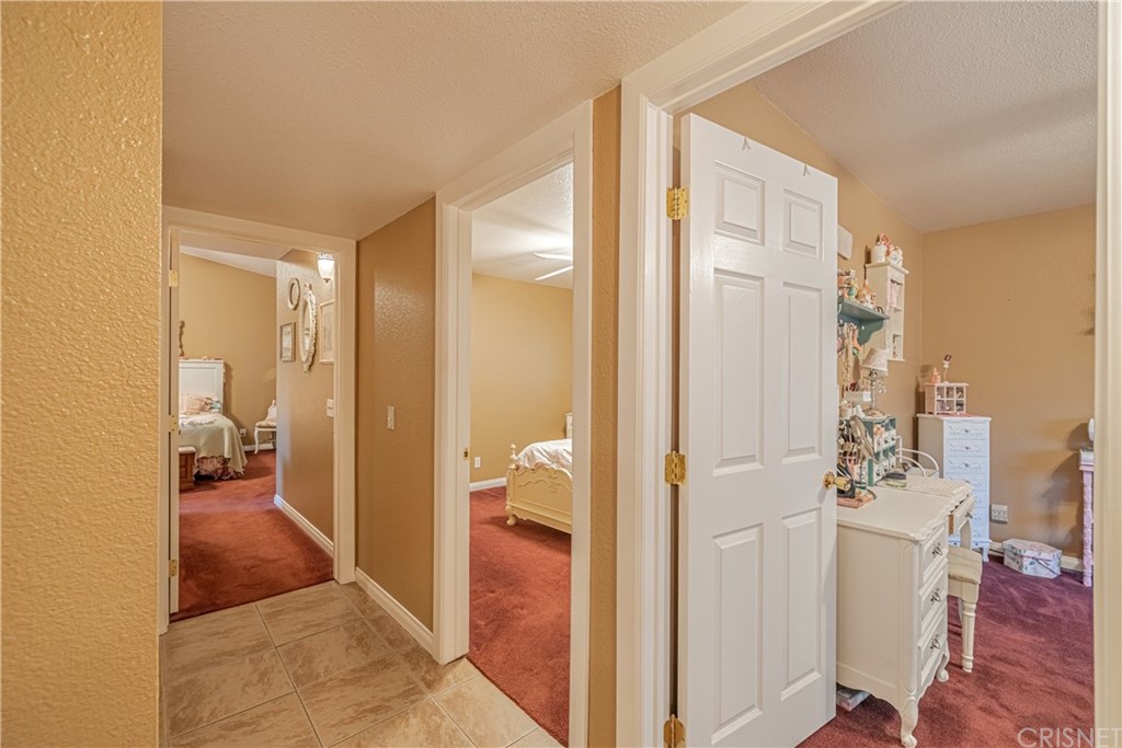 2701 West Ave J4 Lancaster, CA 93536 - Photo 26 of 46 a bathroom with a sink and a mirror