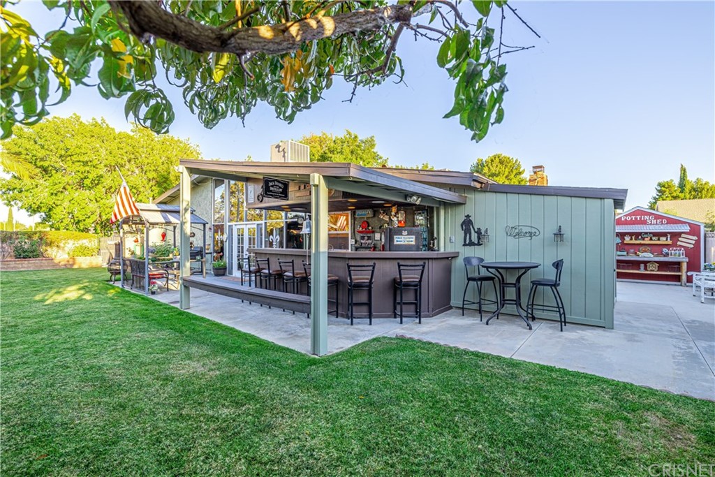 2701 West Ave J4 Lancaster, CA 93536 - Photo 38 of 46 a view of an chairs and table in the patio