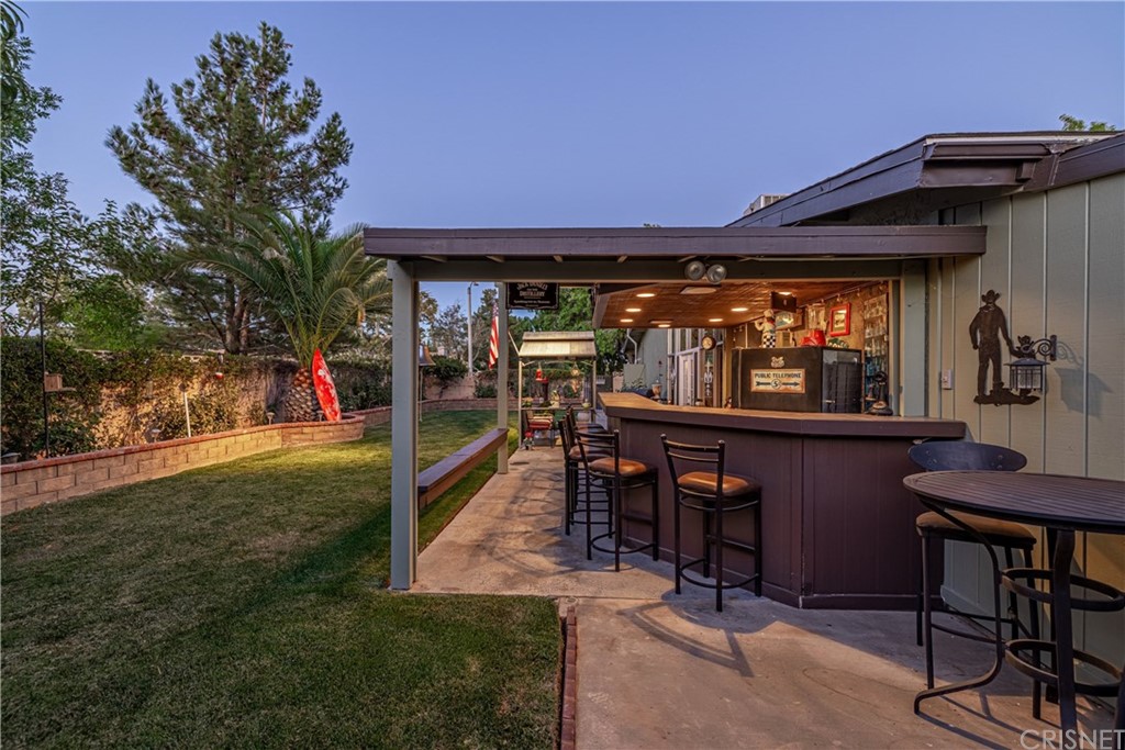 2701 West Ave J4 Lancaster, CA 93536 - Photo 41 of 46 a view of two chairs and a tables in a patio