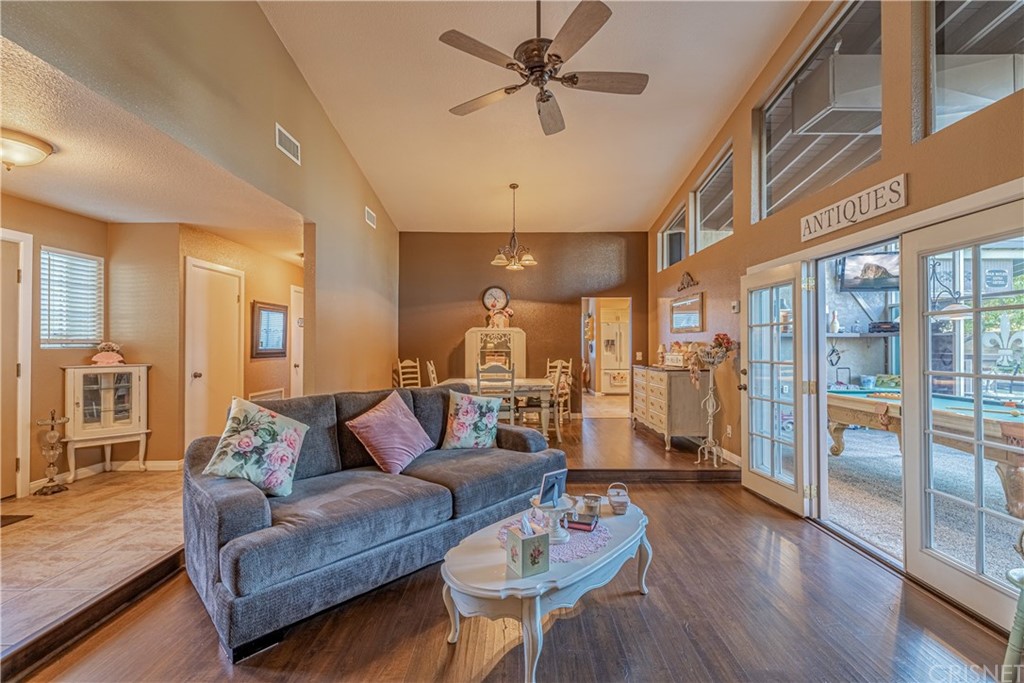 2701 West Ave J4 Lancaster, CA 93536 - Photo 9 of 46 a living room with furniture and wooden floor