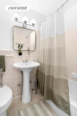 a view of a workspace with furniture and a potted plant
