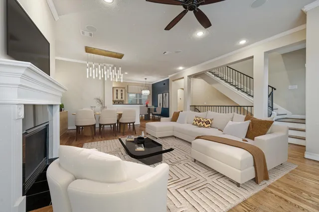 a kitchen with stainless steel appliances granite countertop a refrigerator a stove and a sink