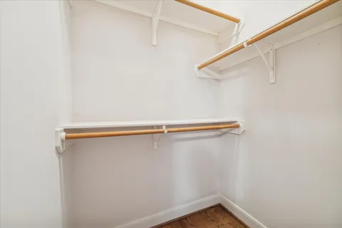 a view of a room with racks on the wall