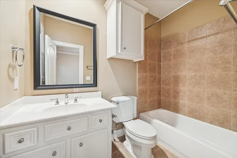 a bathroom with a sink a toilet and a bathtub