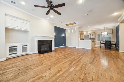 a view of a kitchen with a stove cabinets and wooden floor