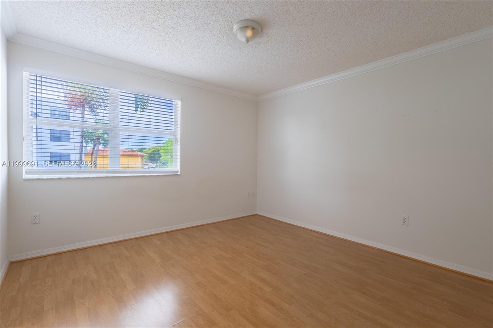 13874 Southwest 64th Street Miami, FL 33183 - Photo 19 of 25 an empty room with a window