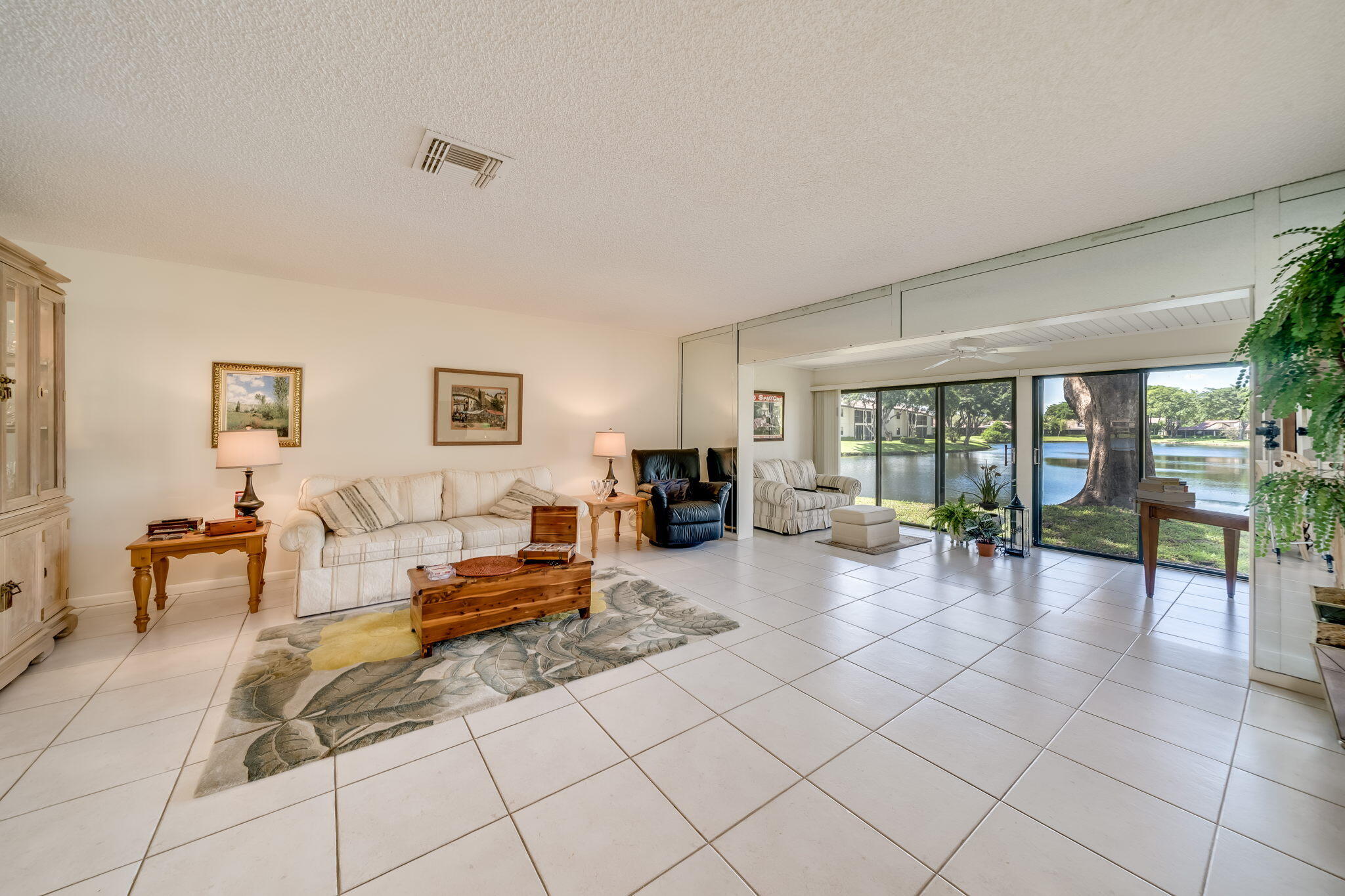 21743 Arriba Real, Unit 28G Boca Raton, FL 33433 - Photo 16 of 42 LIVING/SUNROOM