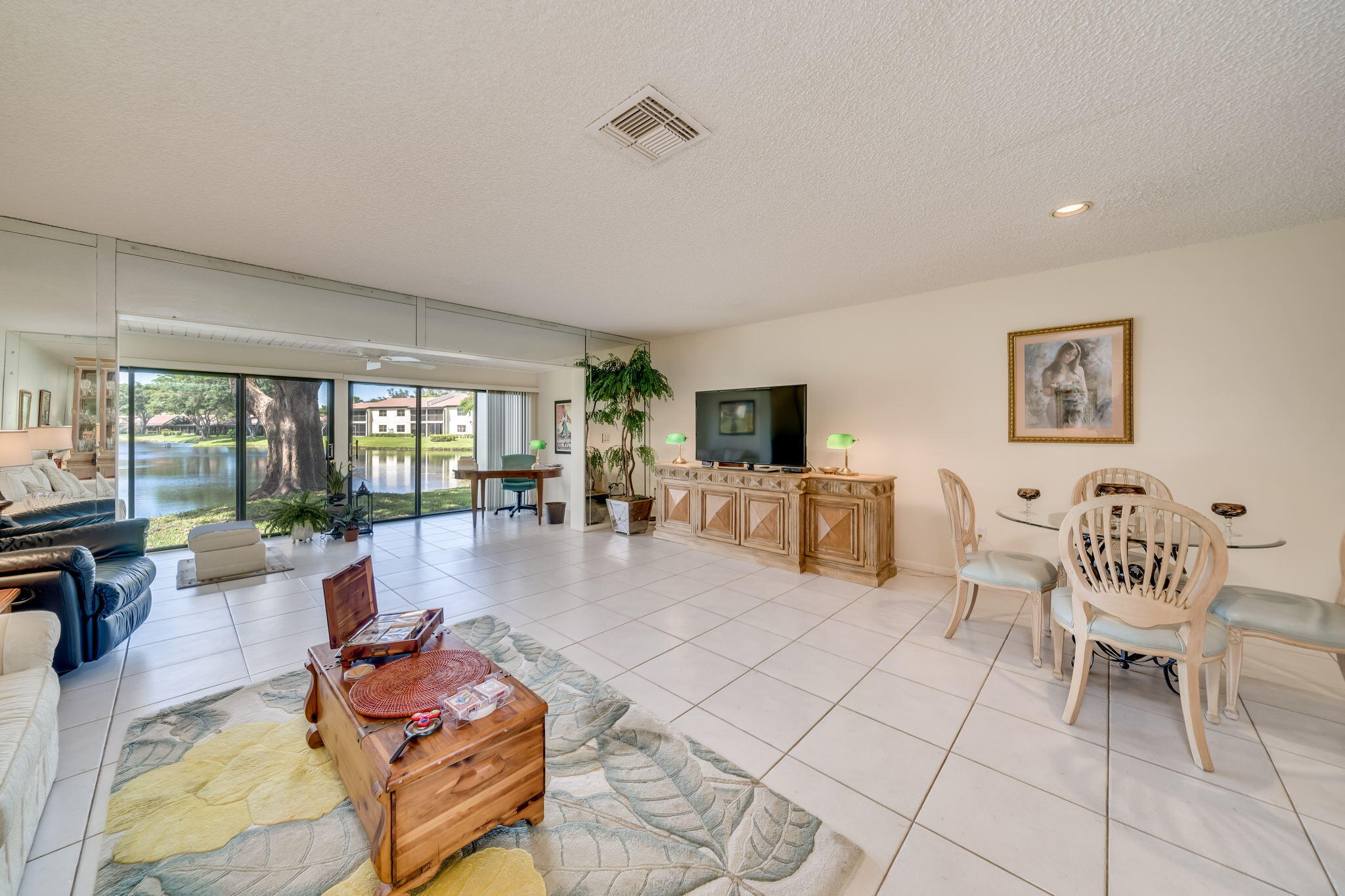 21743 Arriba Real, Unit 28G Boca Raton, FL 33433 - Photo 17 of 42 LIVING/SUNROOM