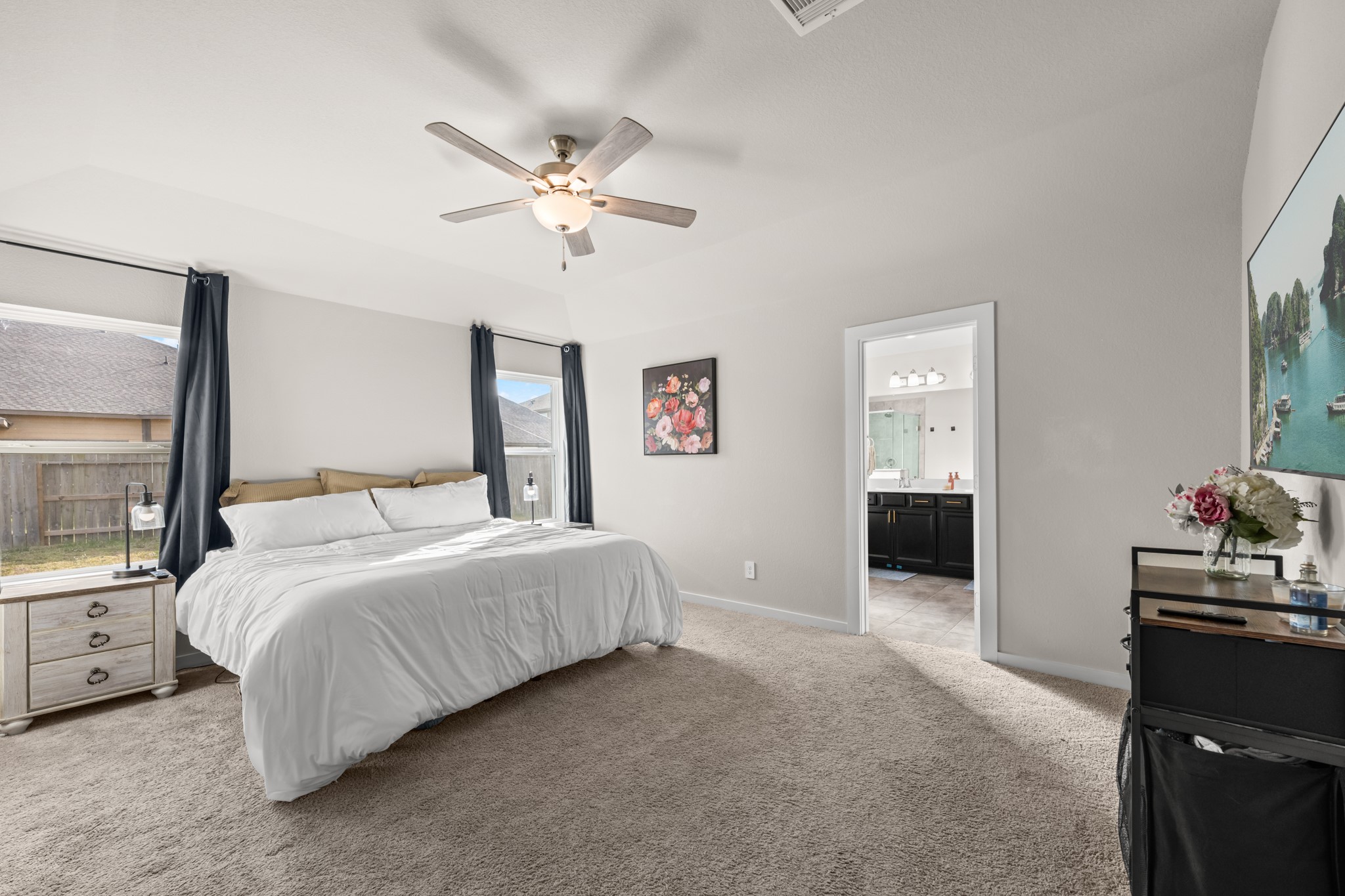 1326 Taft Pt Lane Rosharon, TX 77583 - Photo 20 of 39 a bedroom with a bed and a chandelier