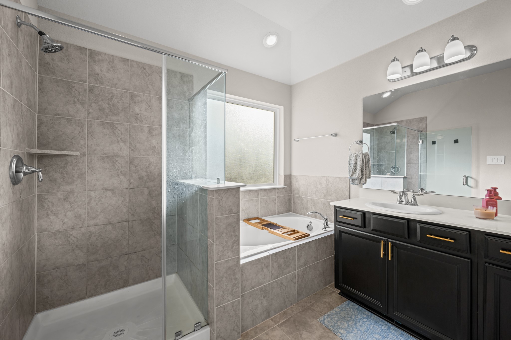 1326 Taft Pt Lane Rosharon, TX 77583 - Photo 25 of 39 a bathroom with a double vanity sink mirror and shower