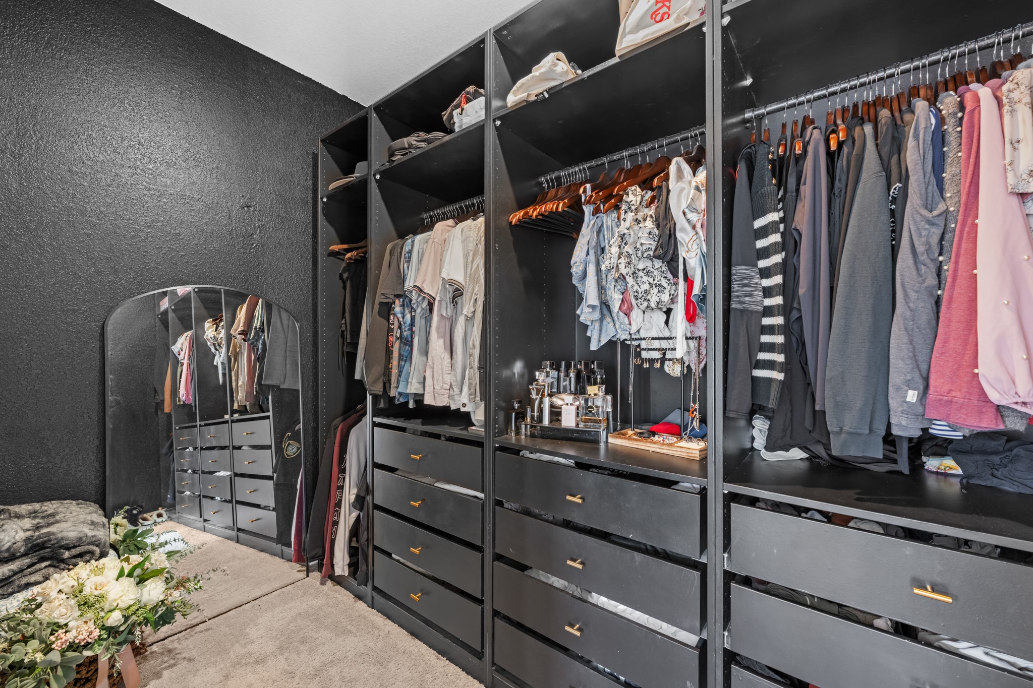 1326 Taft Pt Lane Rosharon, TX 77583 - Photo 26 of 39 a view of walk in closet with clothes