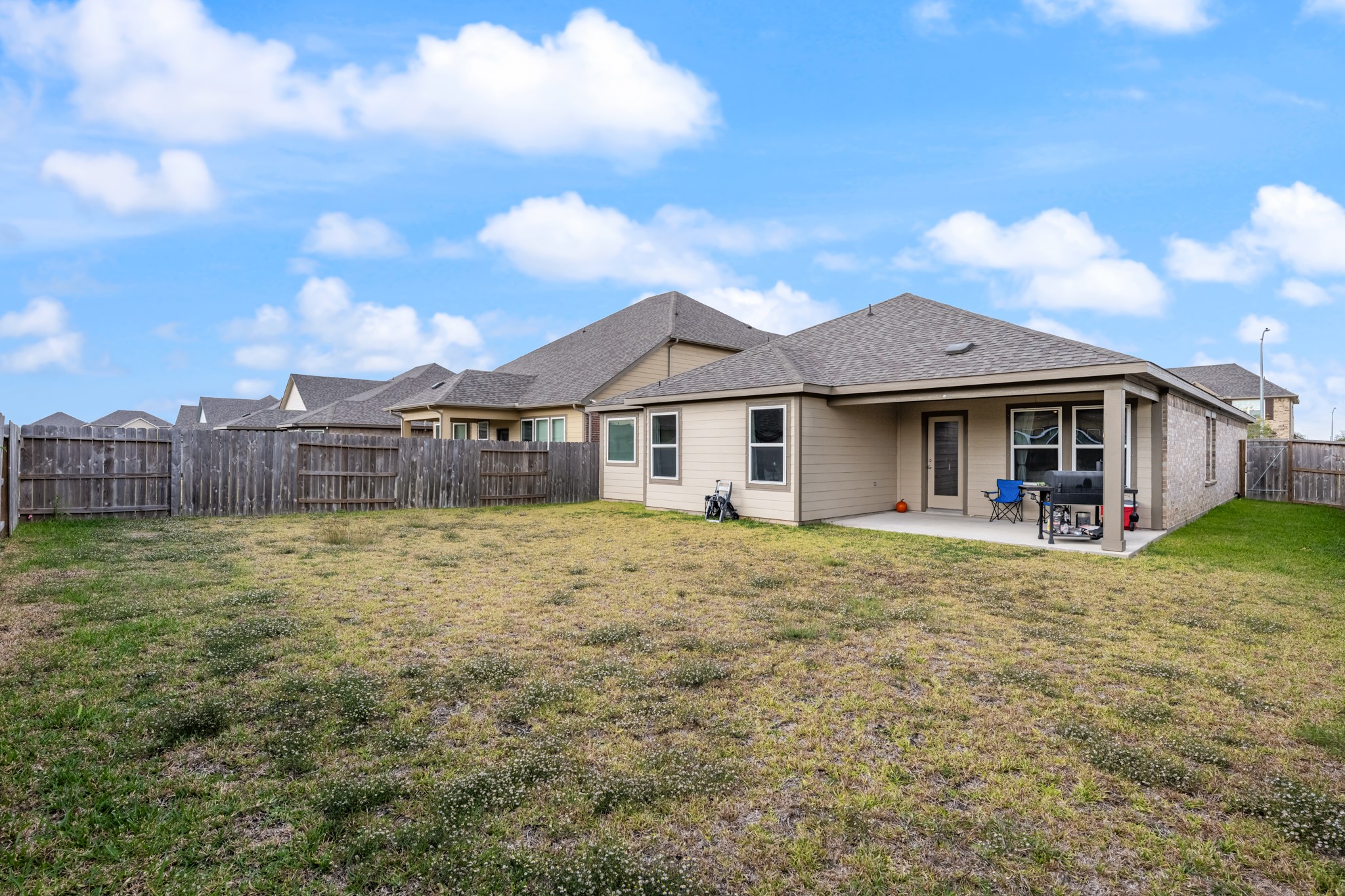 1326 Taft Pt Lane Rosharon, TX 77583 - Photo 38 of 39 a view of a house with a yard