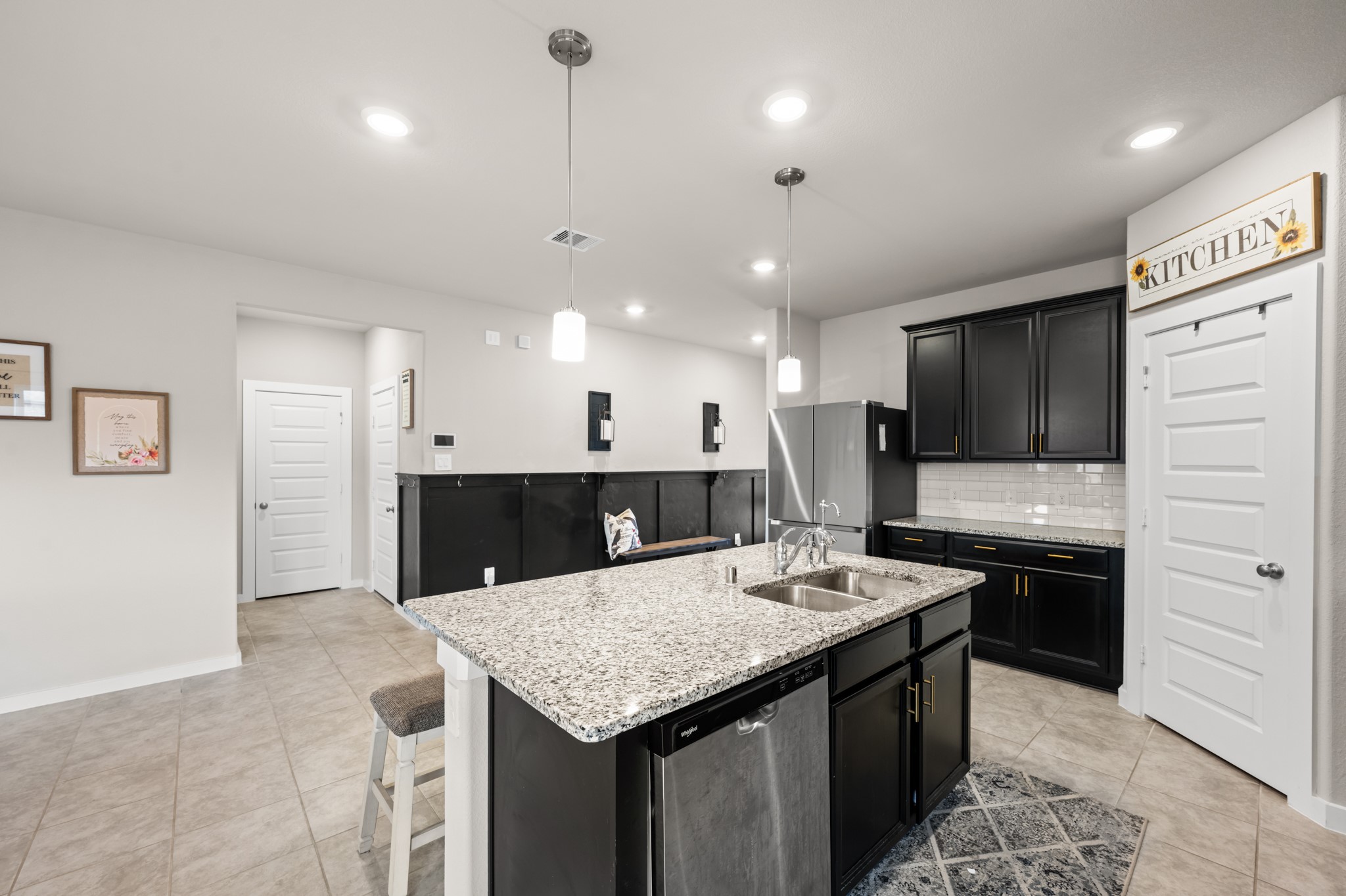 1326 Taft Pt Lane Rosharon, TX 77583 - Photo 9 of 39 a kitchen with stainless steel appliances granite countertop a sink a stove a refrigerator and a oven
