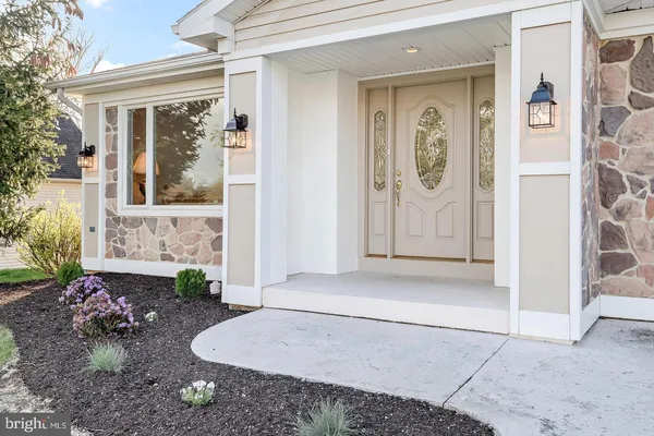 a view of a entryway door front of house
