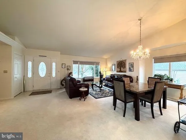 a view of a livingroom with furniture and window