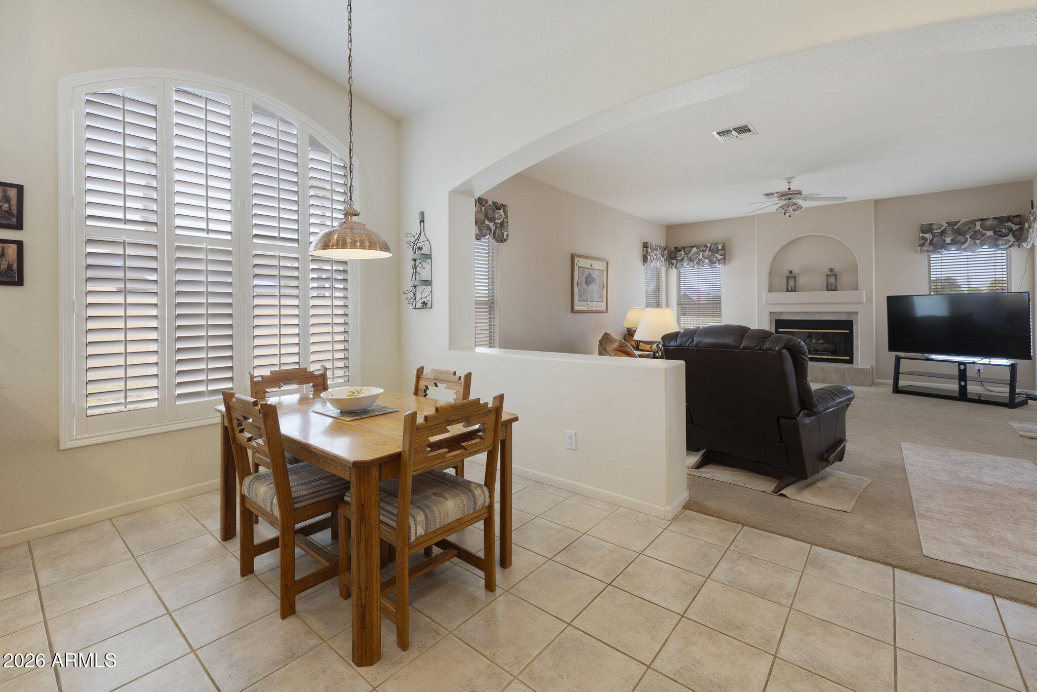 12435 West Monte Vista Road Avondale, AZ 85392 - Photo 23 of 69 a view of a dining room with furniture