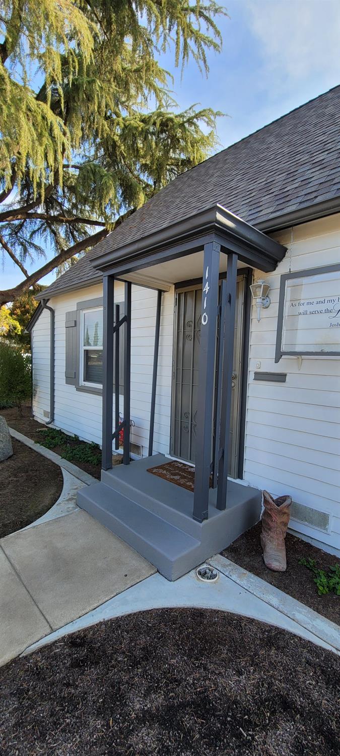 1410 10th Street Reedley, CA 93654 - Photo 12 of 44 a front view of a house
