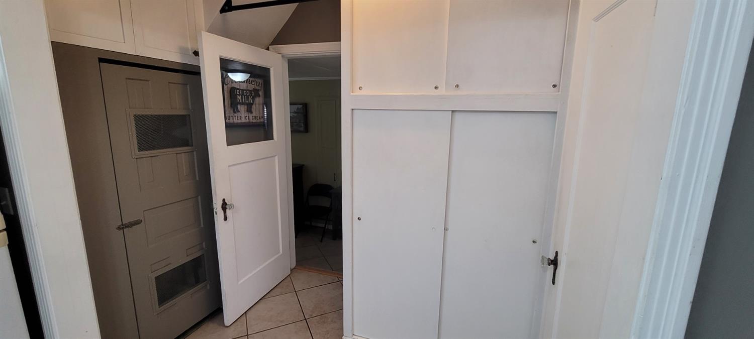 1410 10th Street Reedley, CA 93654 - Photo 21 of 44 a view of walk in closet