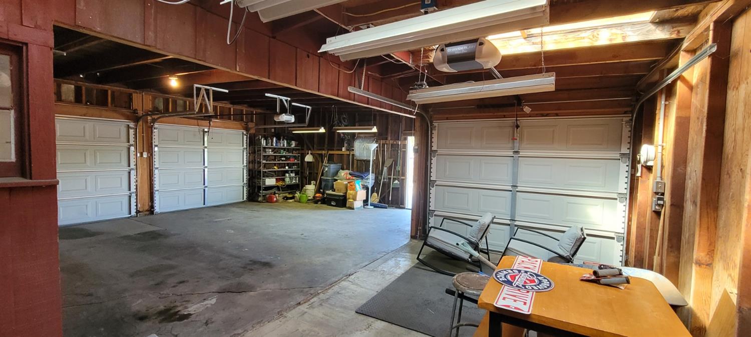 1410 10th Street Reedley, CA 93654 - Photo 42 of 44 a view of room with wooden shelves