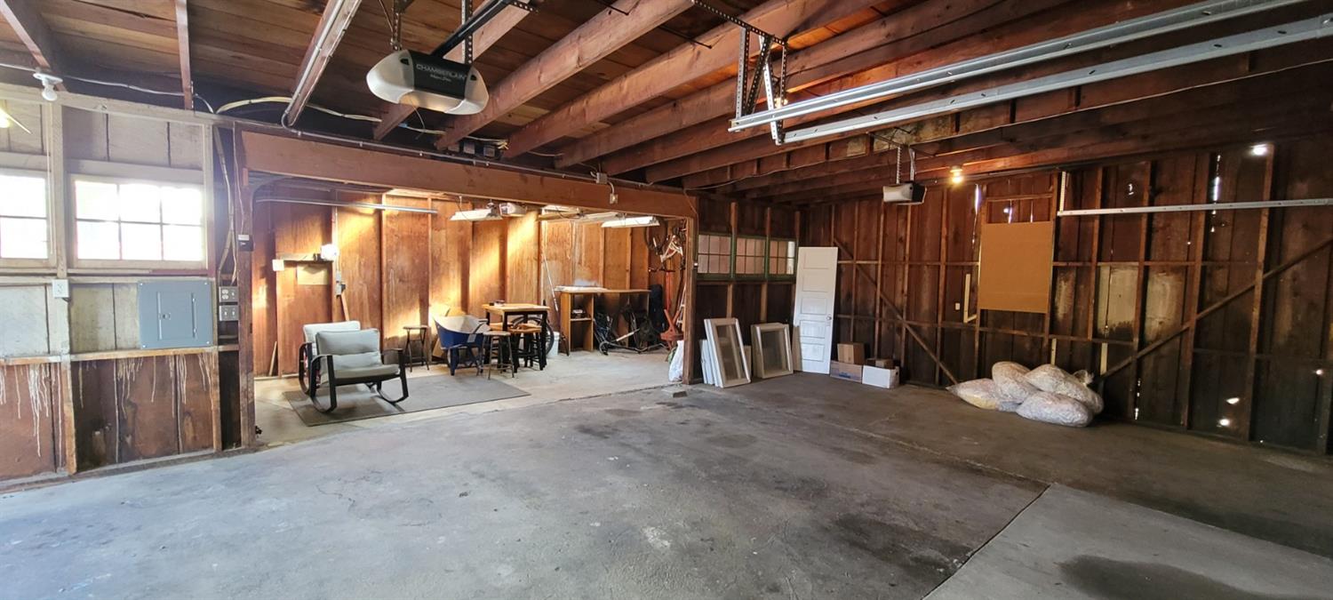 1410 10th Street Reedley, CA 93654 - Photo 44 of 44 a view of a hall with wooden floor