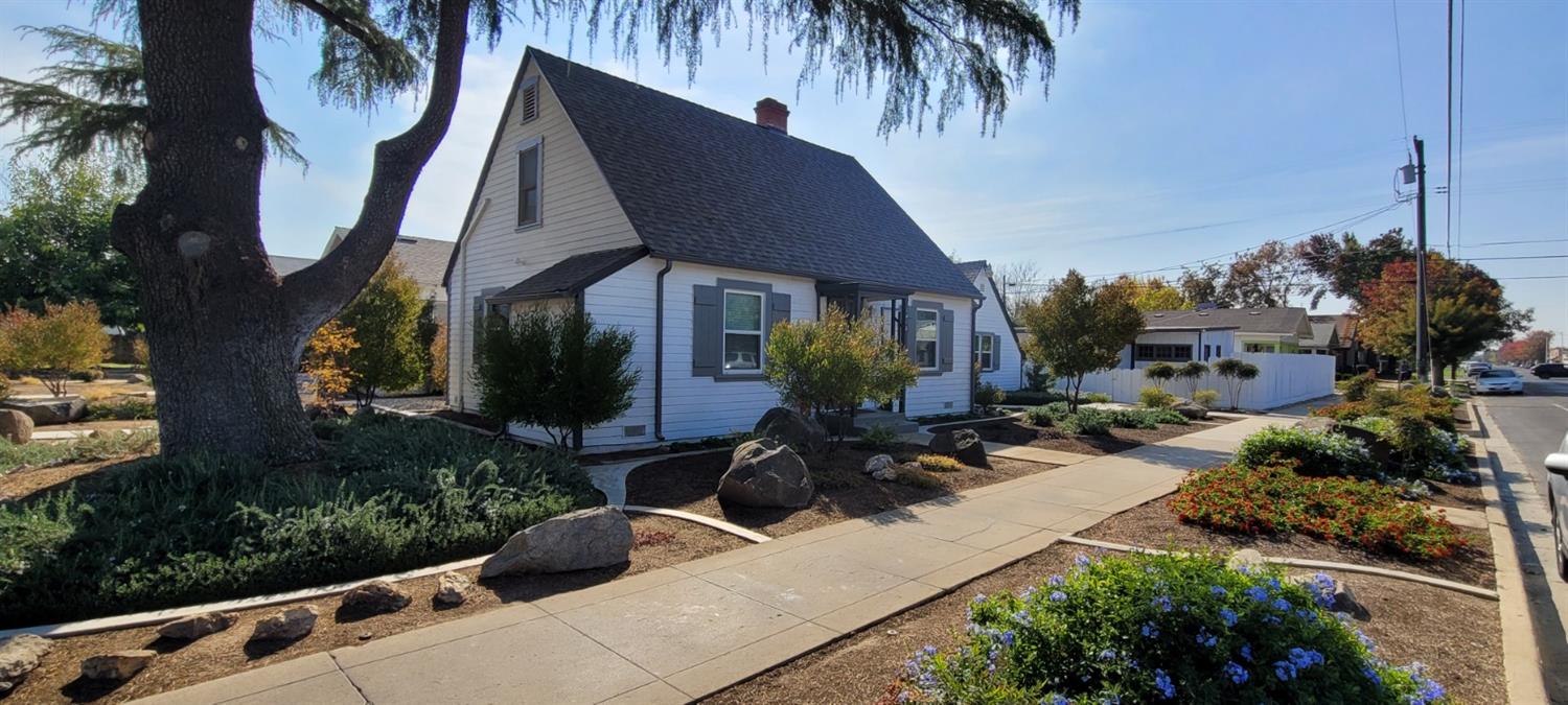 1410 10th Street Reedley, CA 93654 - Photo 6 of 44 a view of a house with a patio