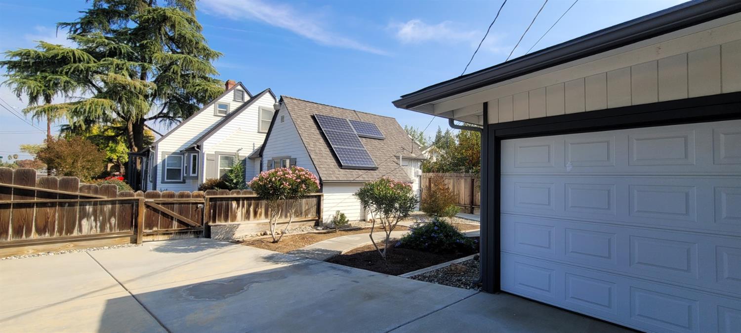 1410 10th Street Reedley, CA 93654 - Photo 10 of 44 a view of house with outdoor space
