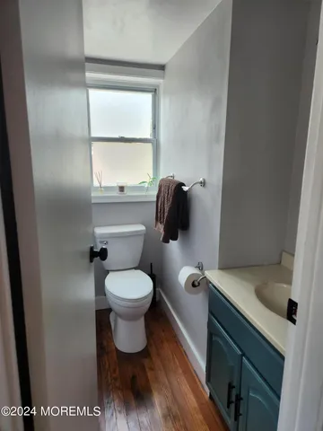 a bathroom with a toilet and a sink