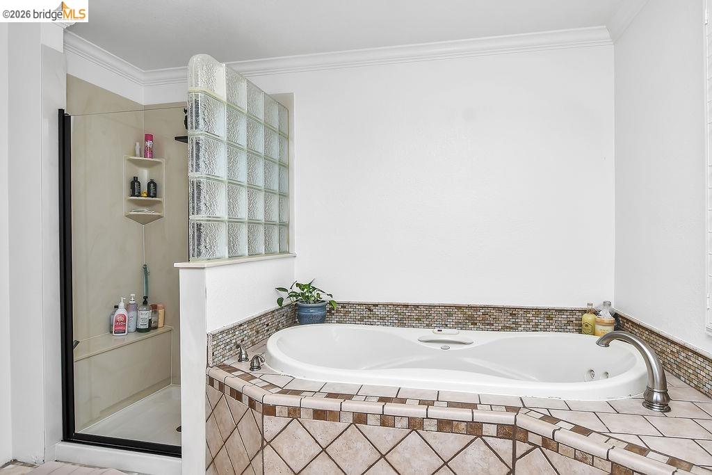 4190 Brown Road Oakley, CA 94561 - Photo 25 of 33 Full bath featuring a garden tub, a stall shower, and crown molding