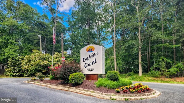 a sign on the side of the road