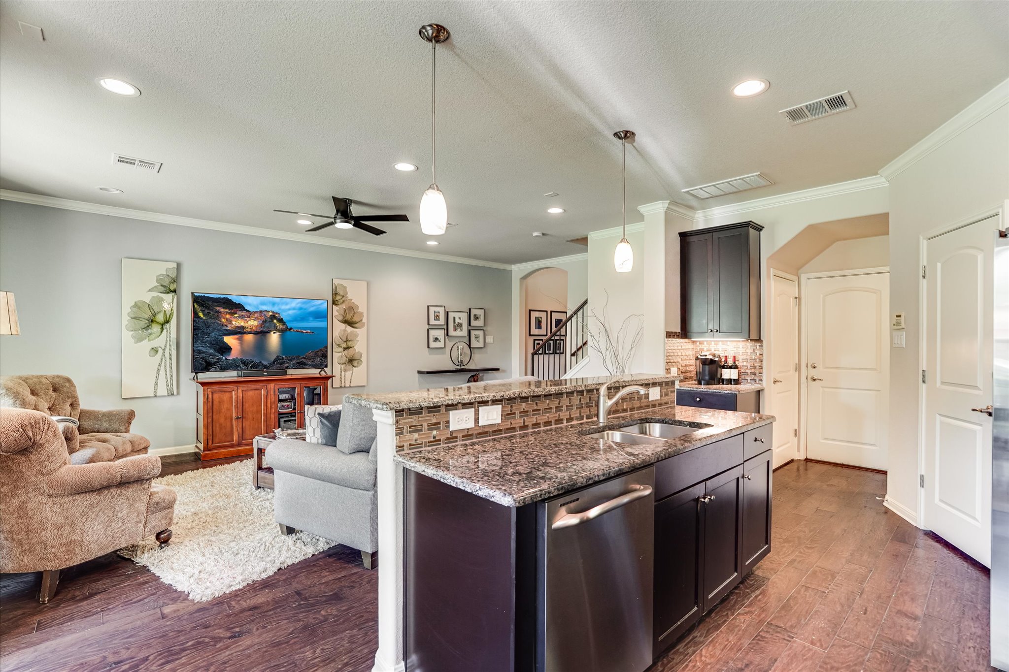 14001 Avery Ranch Boulevard, Unit 202 Austin, TX 78717 - Photo 2 of 5 a kitchen with stainless steel appliances granite countertop a stove and a sink