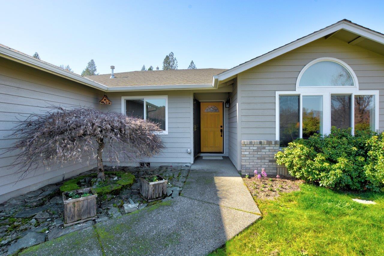 2614 Southwest Allen Creek Road Grants Pass, OR 97527 - Photo 2 of 39 Lovely concrete path to front door with simple beauty.