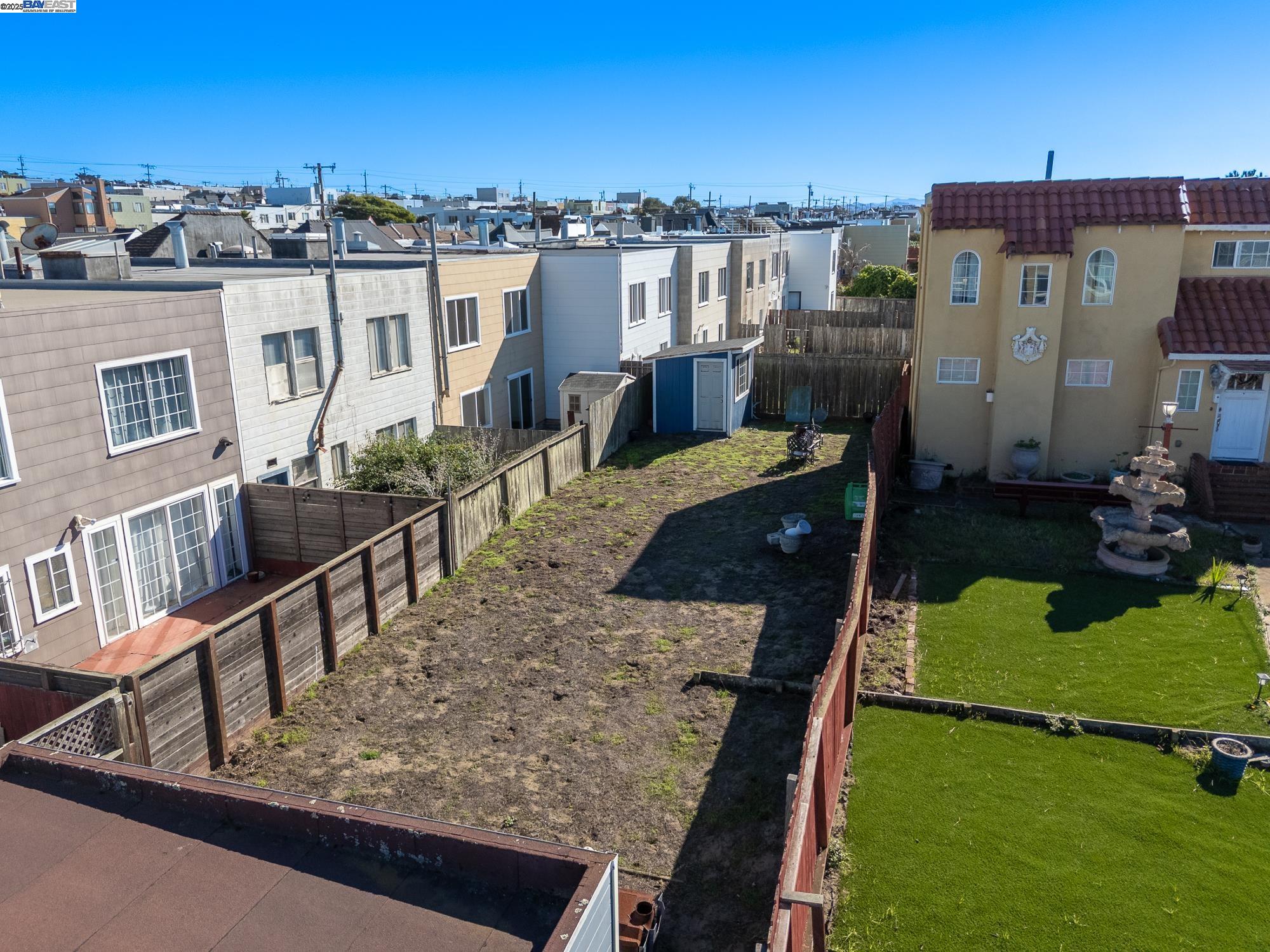 3327 Quintara Street San Francisco, CA 94116 - Photo 20 of 33 a view of a balcony with two chairs and a yard