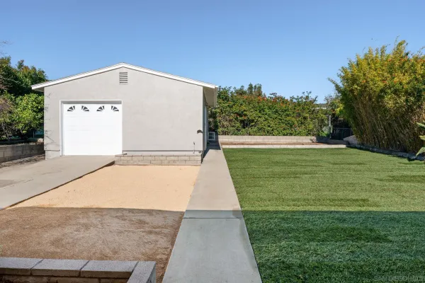 a view of backyard with green space
