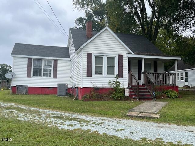 340 Cavel Chub Lake Road Roxboro, NC 27574 - Photo 2 of 12 a front view of house with yard