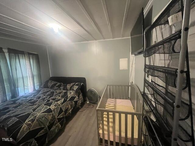 340 Cavel Chub Lake Road Roxboro, NC 27574 - Photo 6 of 12 a bedroom with a bed and a window
