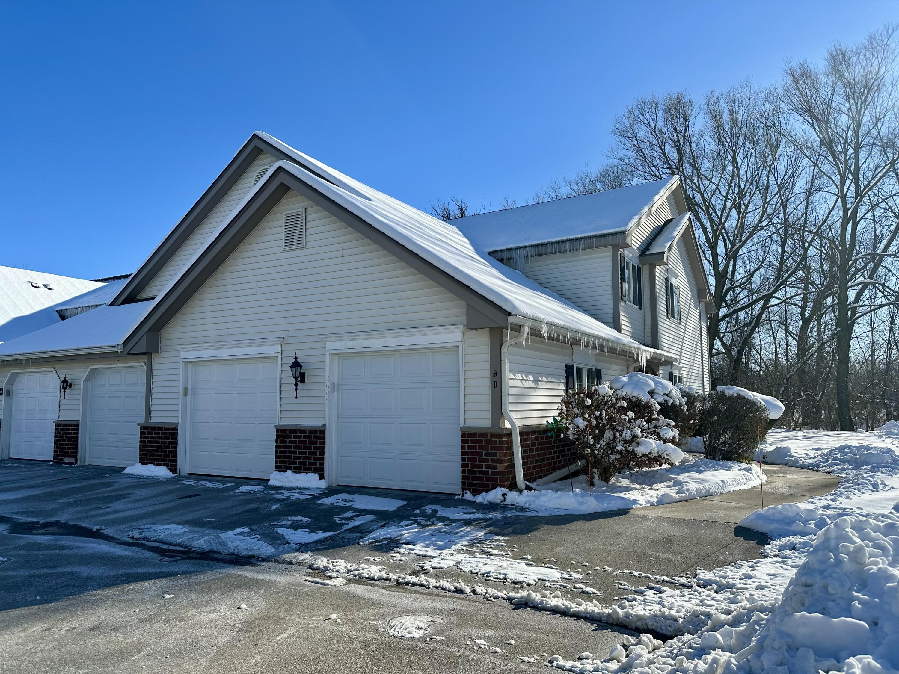 636 Pewaukee Road, Unit H Pewaukee, WI 53072 - Photo 29 of 43 Attached 1.5 car garage
